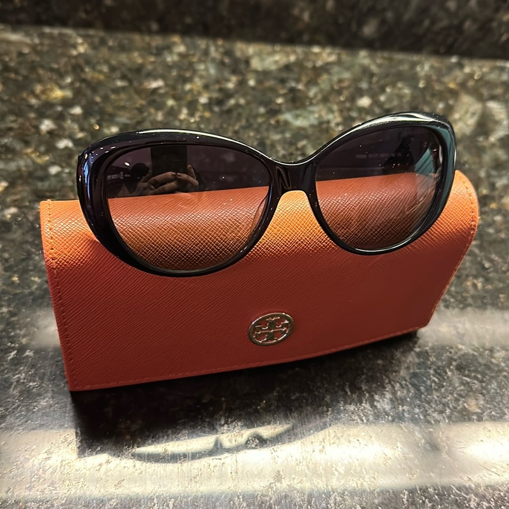 Tory Burch sunglasses.